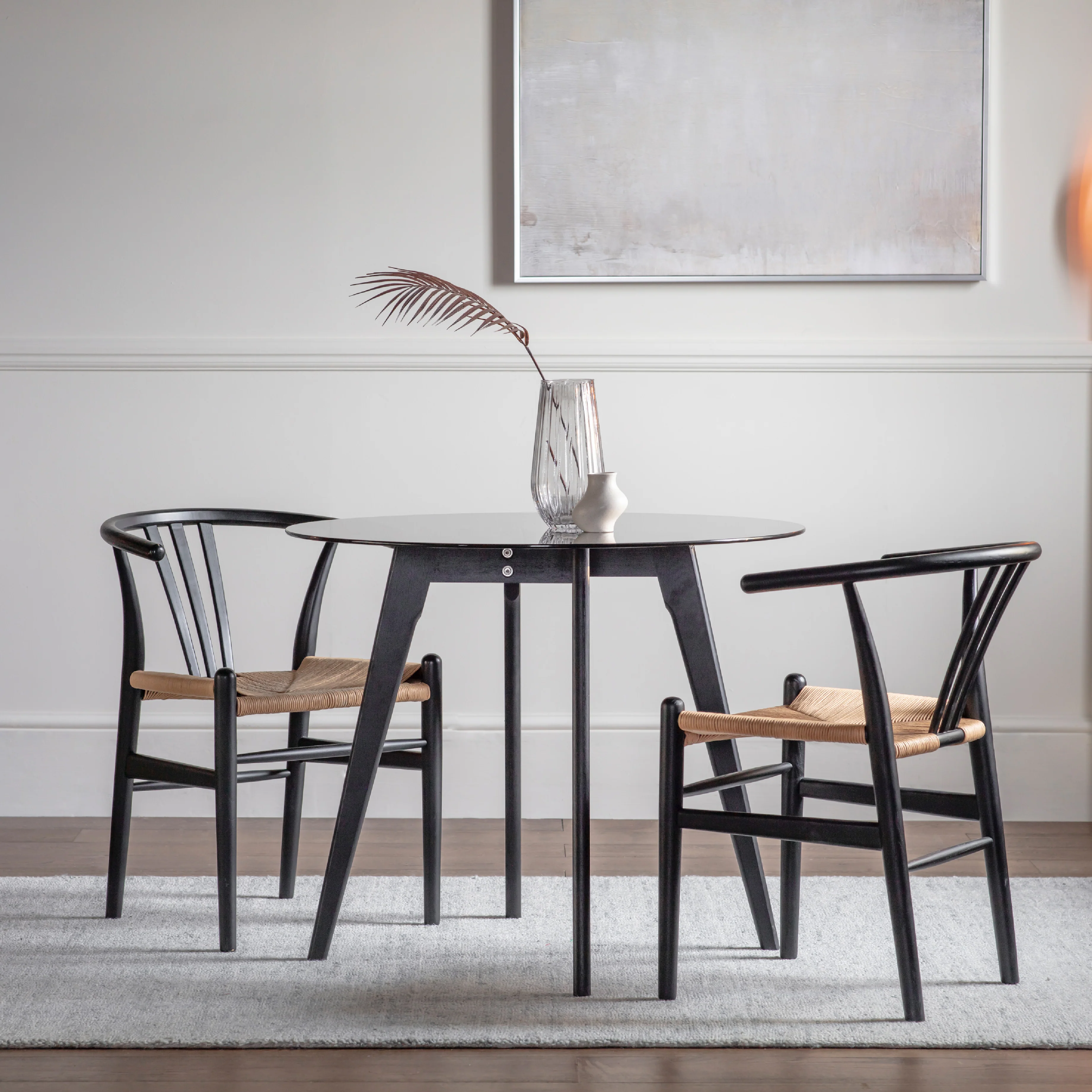 Blair Round Smoked Glass Dining Table | Black Oak